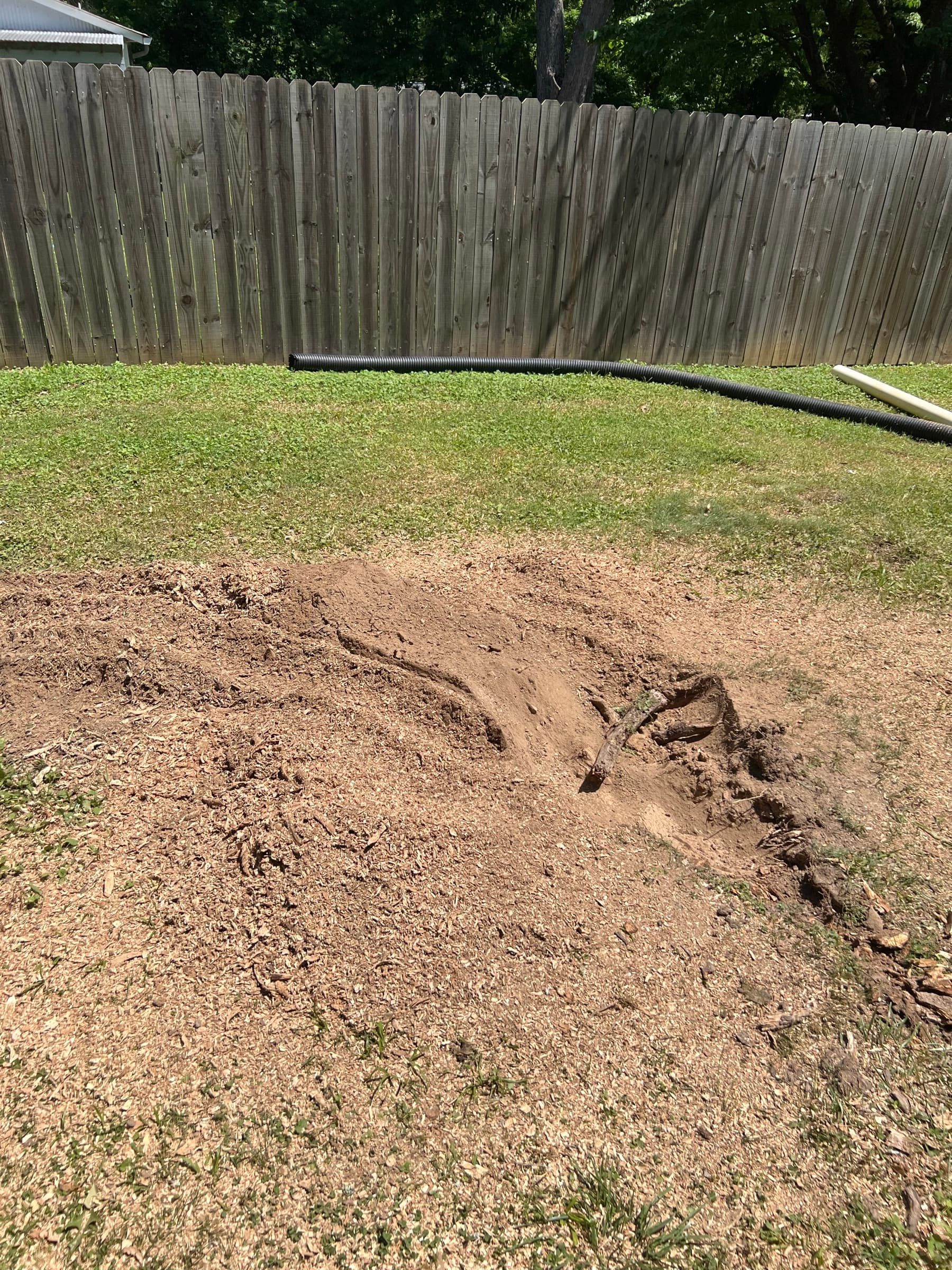 Clean, flat ground after professional stump grinding